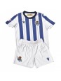 Billige Real Sociedad Hjemmedraktsett Barn 2025-26 Kortermet (+ Korte bukser)